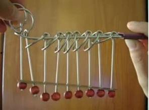 九连环解法视频慢放,慢放视频中的巧妙步骤解析